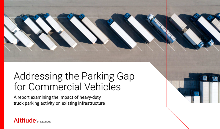 An image showing an aerial view of parked commercial trucks in a lot. Overlaid text reads: 'Addressing the Parking Gap for Commercial Vehicles: A report examining the impact of heavy-duty truck parking activity on existing infrastructure.' Branded with 'Altitude by Geotab' in the bottom left corner.